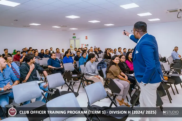 Mayantha training a full room of Toastmasters club officers
